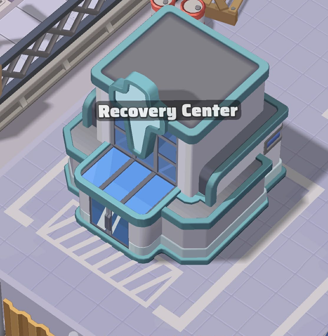 The Recovery Center building with white and grey walls, teal trim and blue windows